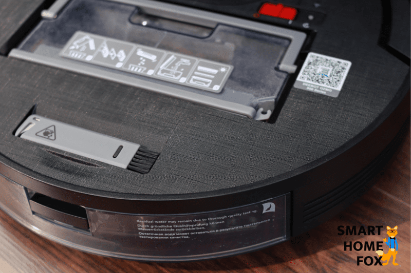 Ecovacs Deebot OZMO 950 stands with an open lid